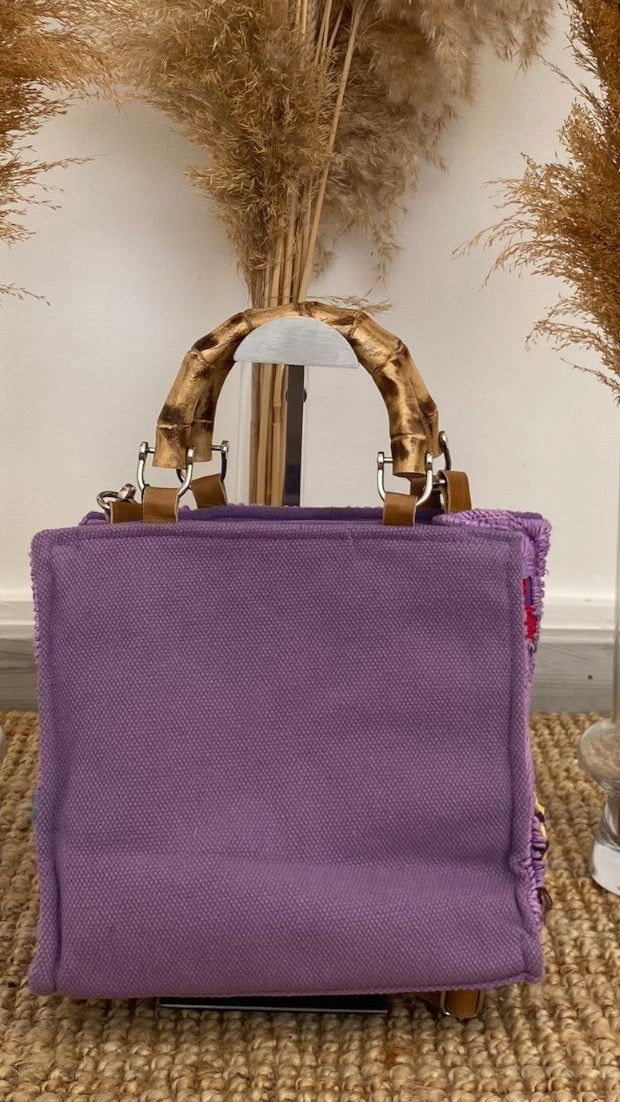 حقيبة مولا باللون الأرجواني