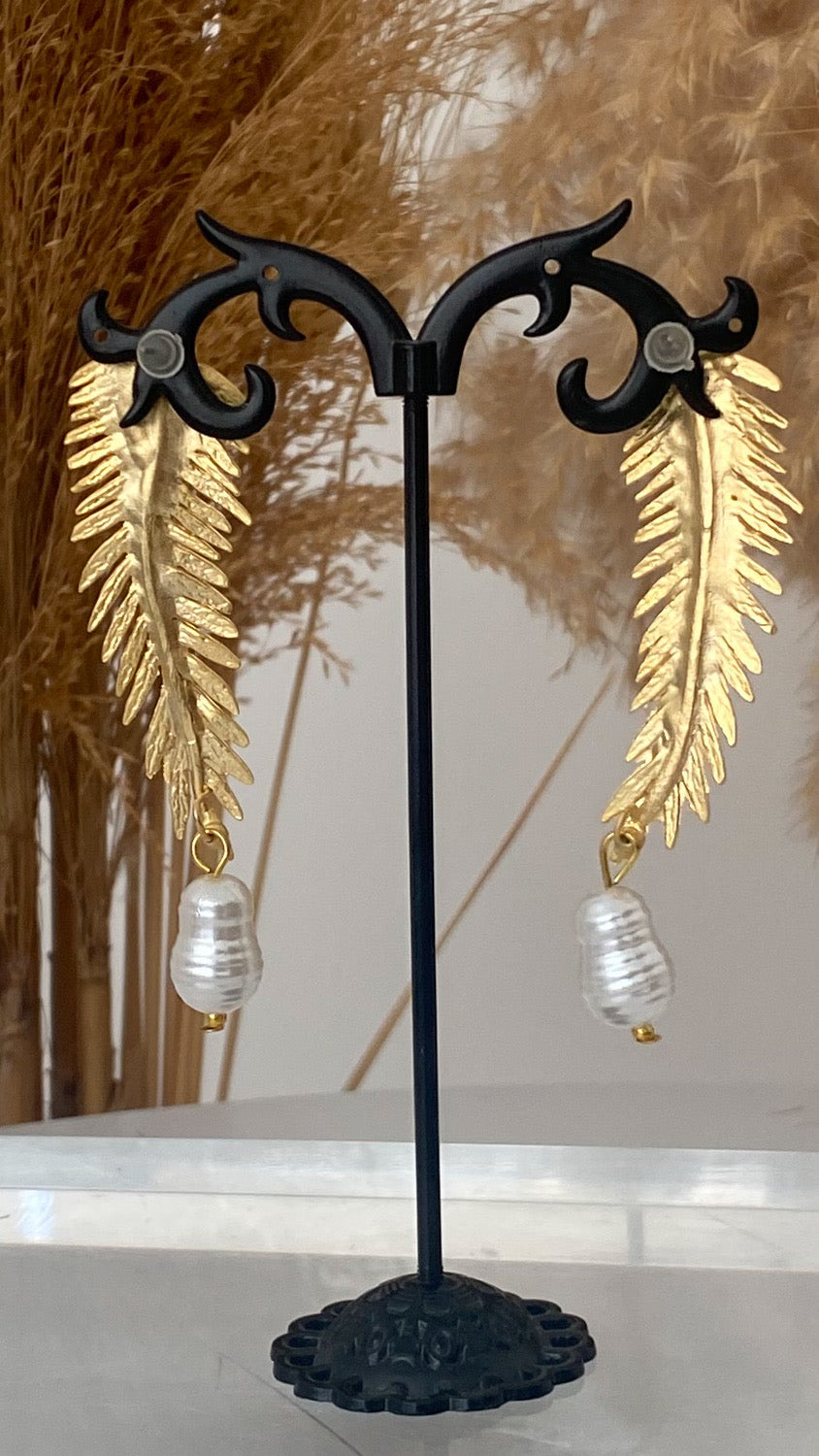 Feather gold earrings